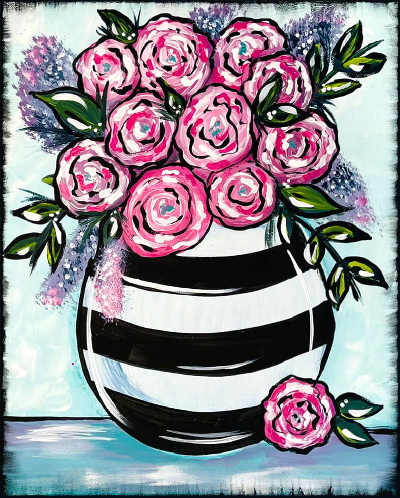 BLACL AND WHITE STRIPED VASE WITH PINK FLOWERS